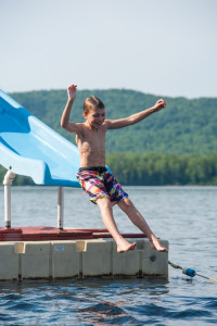 free time waterfront lake fun slide happy camper