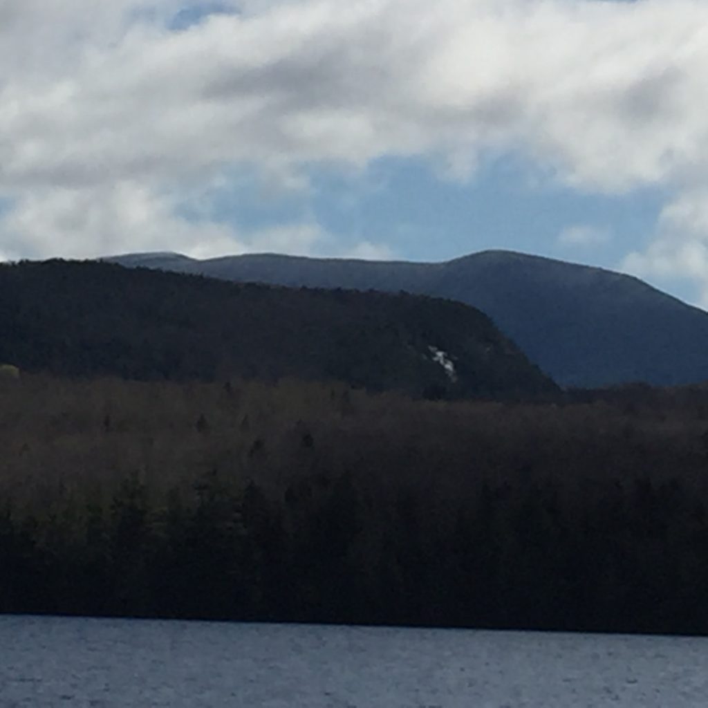 and, on our last night, deposited new snow atop Moosilauke.  Look carefully at the north summit, far left.  