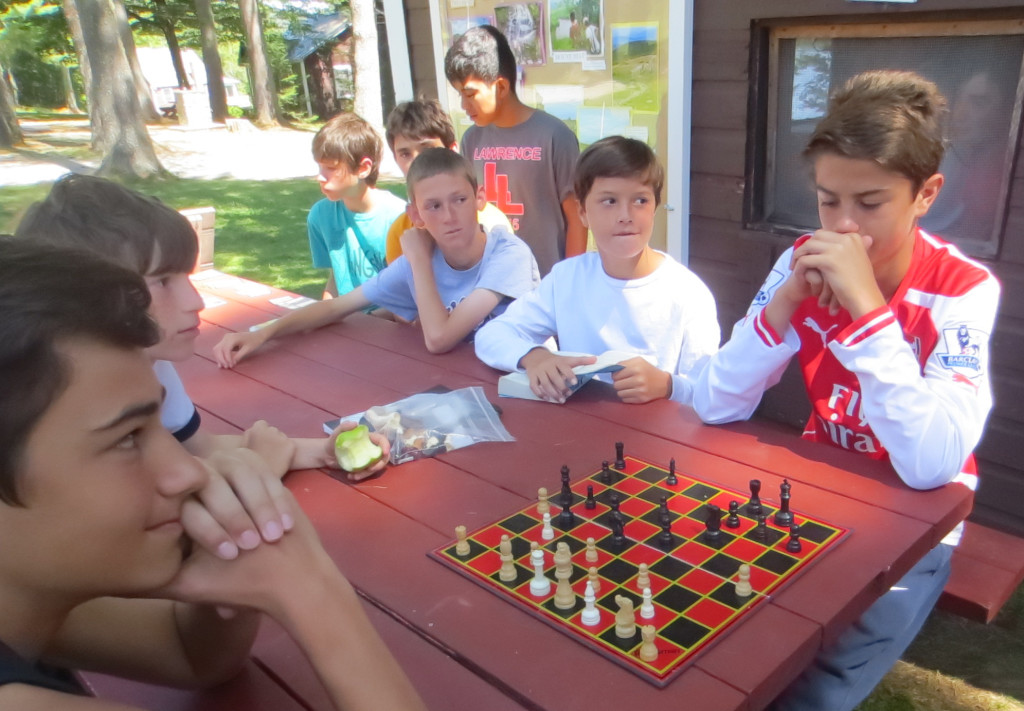 It is great fun to watch boys  deep in mental thought over a chess match.